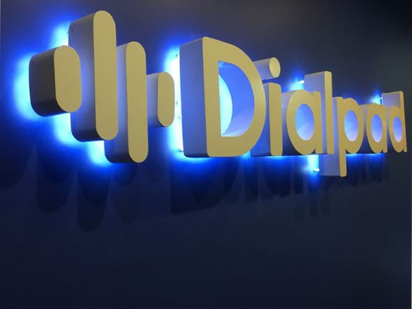 Dialpad channel letters lit from the front and back in blue