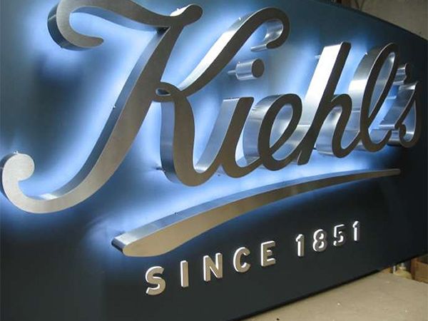 Stainless steel Kiehl’s letters with halo lighting